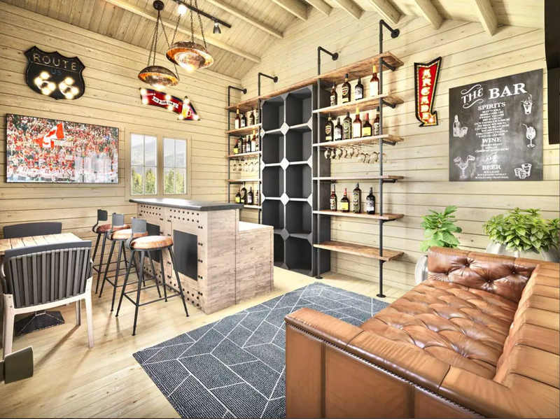 Cozy home bar with wooden walls, shelves, and decor inside of a DIY cabin. 